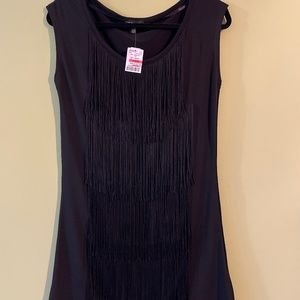 Blank tank with fringe. NWT never worn.